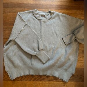 Free People inspired sweater. Grey in color. Raw edges. Cozy.